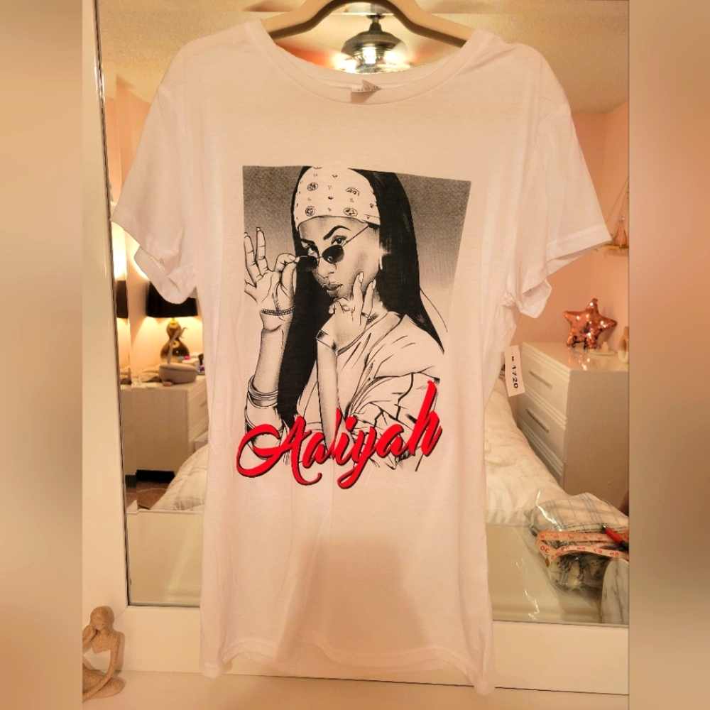 Aaliyah tee fits like a large